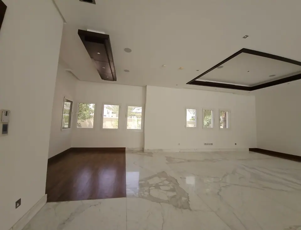 Marble and wood floors meet